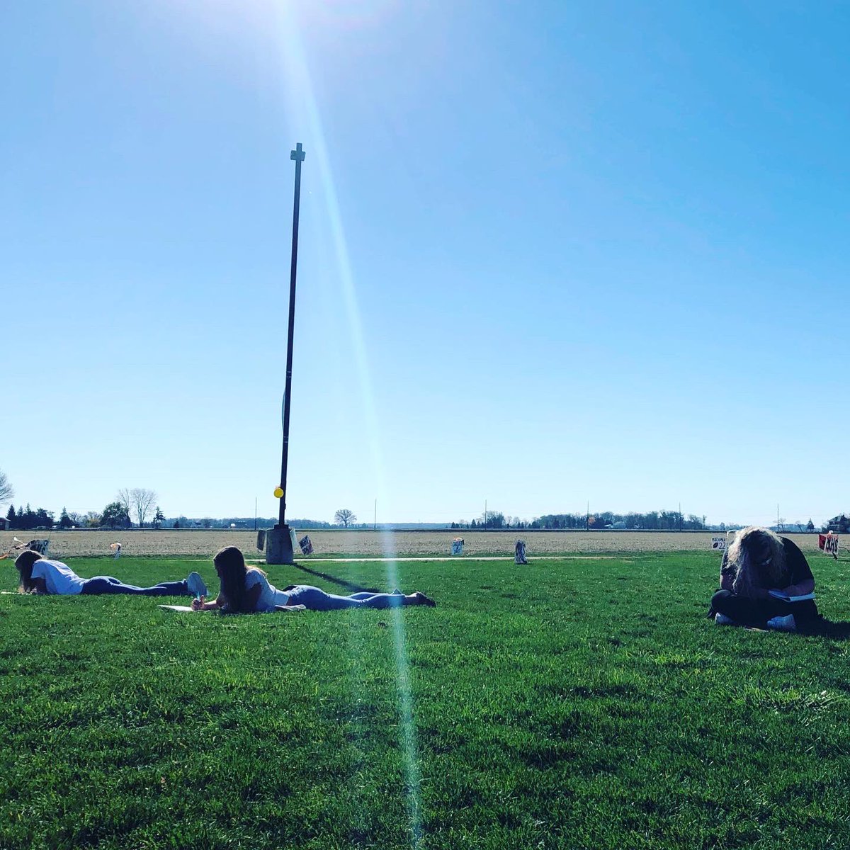 TeenTeacherLA's tweet photo. This afternoon, I took my freshmen outdoors for some fresh air and vitamin D. Today’s record-shattering high temperature and endless blue sky made for the ideal outdoor writing lab. ☀️#KruppELA #HonorsEnglish9Krupp #OtsegoKnights #GorgeousDay #RecordHighTemperature #NWOhioWeather https://t.co/x1alLpA4vW