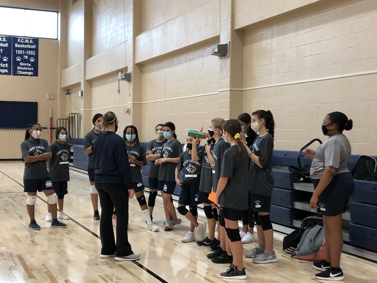 FCMSBobcats's tweet photo. Post practice huddle. These ladies up and putting in the work before the sun shines each morning!
#ladycats #passsethit https://t.co/mjaS3NCLto