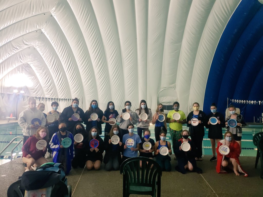 Natick High School Girls Varsity Swimming Diving showing off their paper plate awards. Congratulations ladies!!
