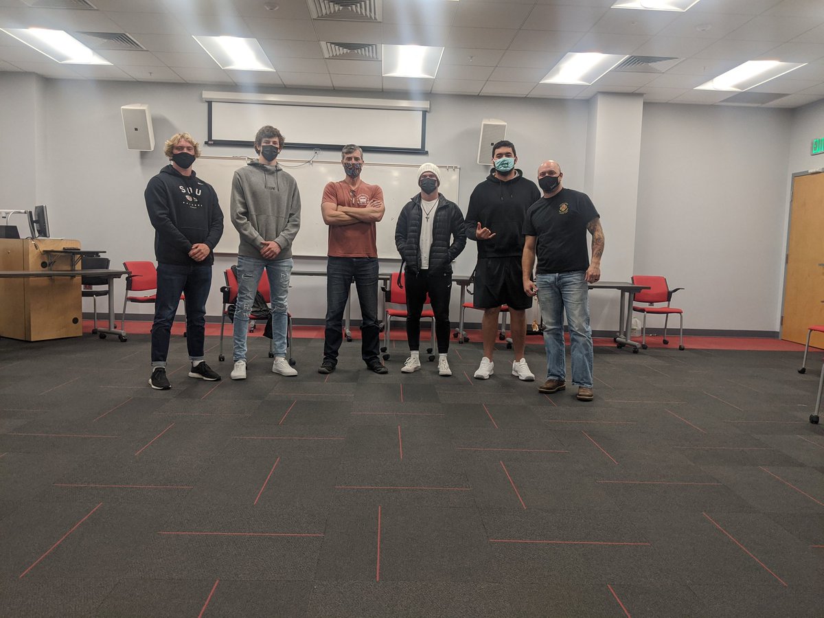 CoachHallcm's tweet photo. Really enjoyed a rare face to face discussion about a career as a firefighter. Thank you Ashland Fire &amp; Rescue Battalion Chief Kelly Burns and Firefighter Ty Haggard for sharing with intersted @SOU_Football players. We appreciate your efforts during the #AlmedaFire. https://t.co/04nbAinaDL