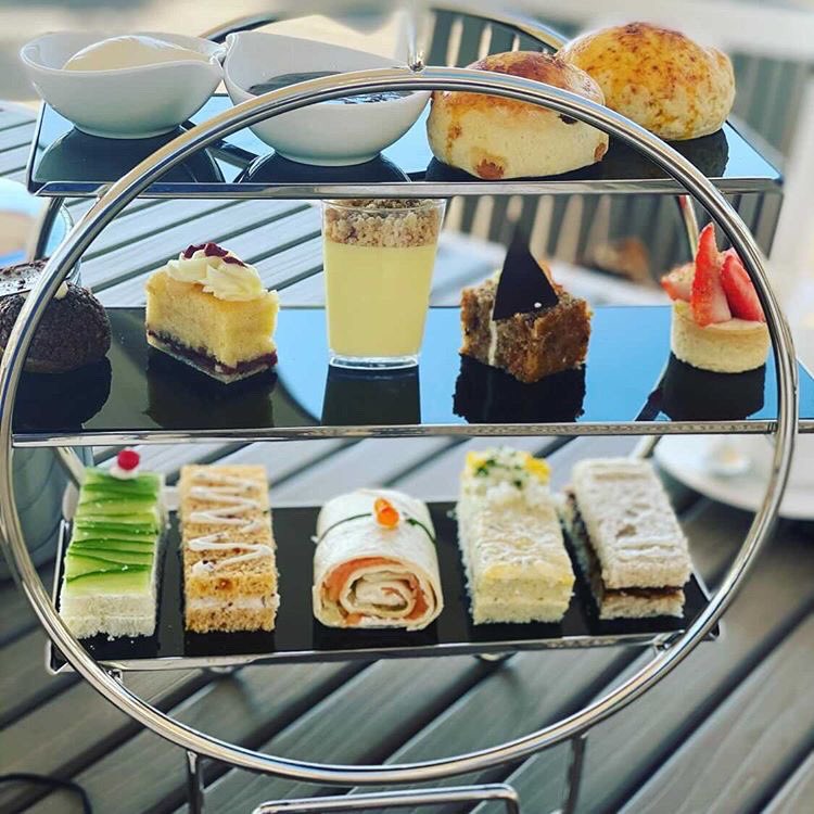 …And relax. Enjoy a moment of calm with a stunning British afternoon tea on board The QE2. 📸 @viktorialuganska 📸 @sharon_milne BOOK NOW: 📧reservations@qe2.com 📞 +971 600500400 QE2.com/offers/afterno… #stillmakinghistory #qe2dubai