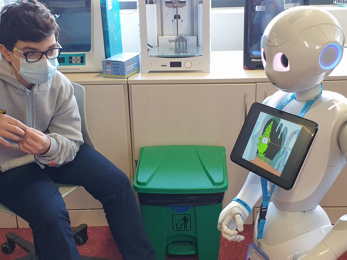 raz_zed's tweet photo. Students welcomed Pepper bot to our class today to help plan our Digital Storytelling though Robots unit. We begin writing our own adventure stories in Python before bringing them to life with Pepper. #DAAinnovation #DAAinnovate #PepperBot #DigitalStorytelling #Python #Coding https://t.co/GUKXOlmMZc