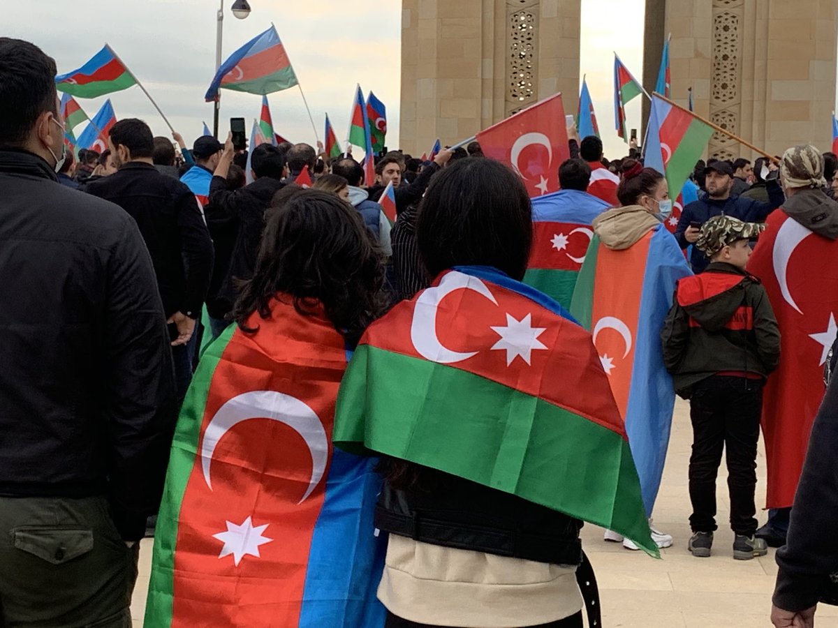 OrlaGuerin's tweet photo. Crowds gathering at Martyrs Alley in #Baku - for Azerbaijan this is a historic victory, a sense that a painful chapter in the nation’s history is being closed. https://t.co/jL6ZRN6j04