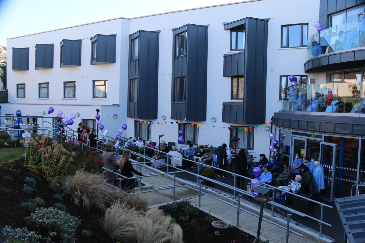 NursingHomesIre's tweet photo. Live music visited the residents &amp; staff of @AshfordHouse last weekend. @MMMQuartet performed in the nursing home gardens as residents watched on from their gardens and balconies. It was a performance enjoyed by all  #caringtogether https://t.co/G66JYgB45R
