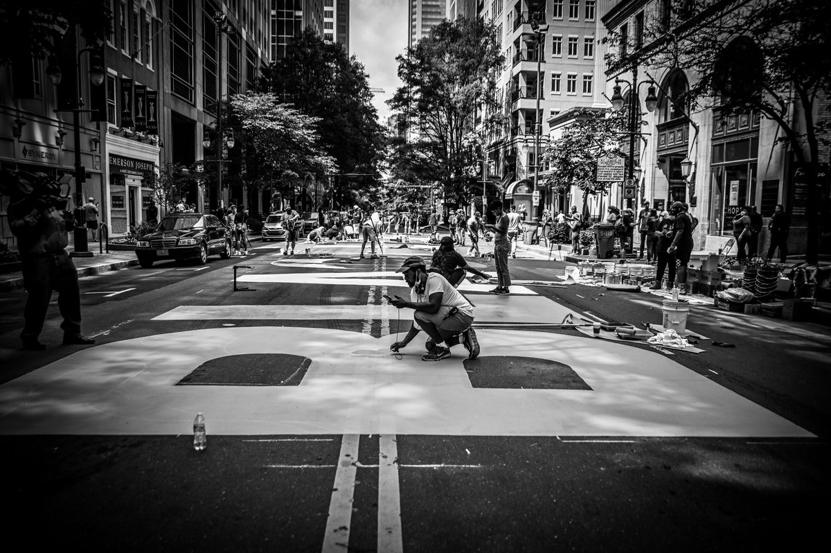acjphoto's tweet photo. It was never about the mural... it was about this. Charlotte can never allow us to recognize our superpower and that is unity. There isn't a business on that block that has created a space as powerful and inclusive as this so cut the shit... https://t.co/twsT5WhAcm