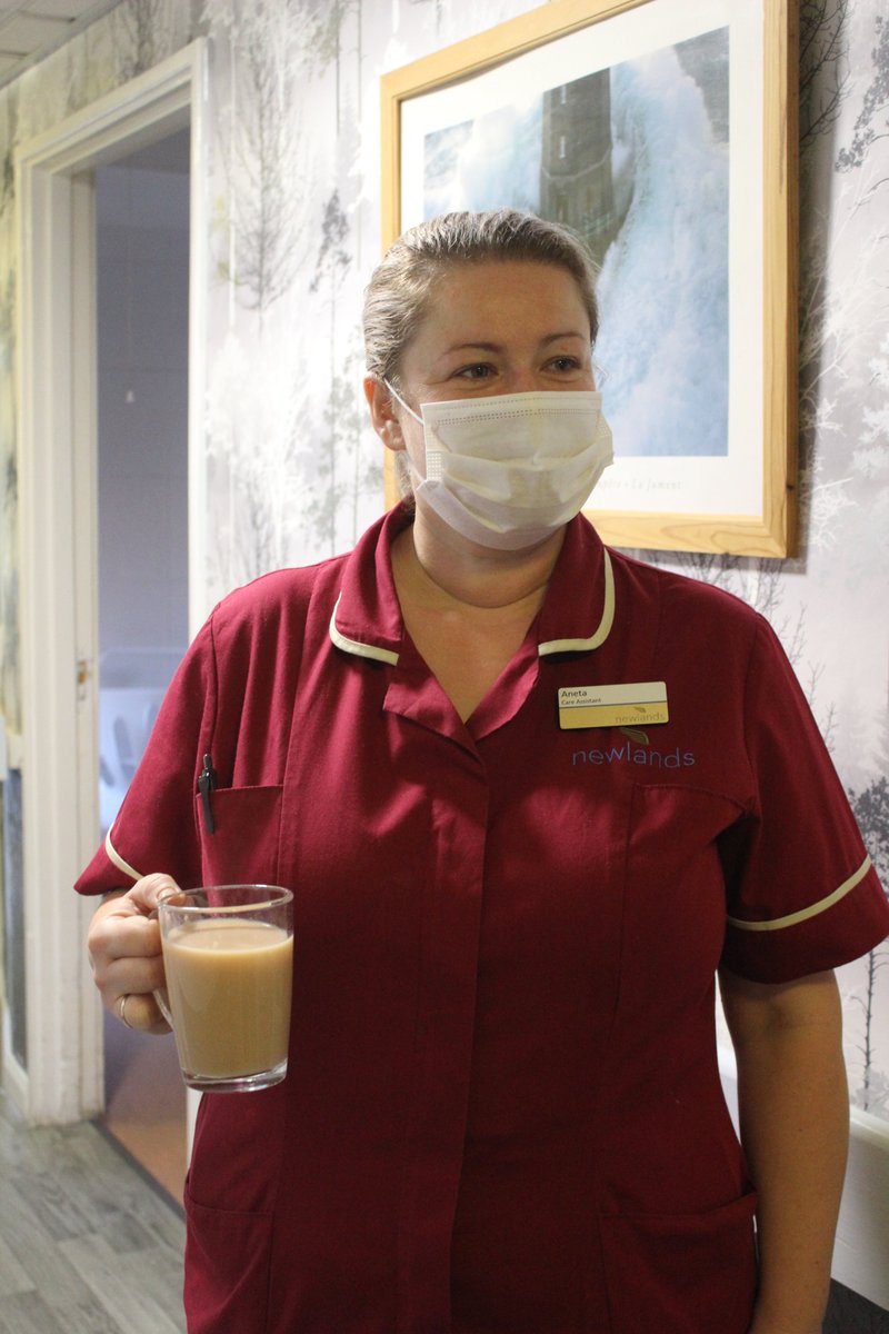 One of our staff at Newlands Care Home doing the most important task of the day - delivering tea! You can't beat a good #cuppa. #newlandsCH #newlands #carehome #angelcareplc #salford #jewishcarehome