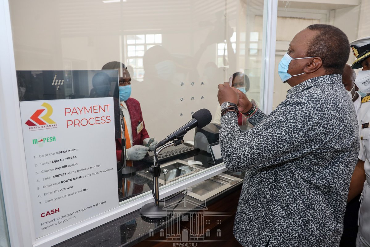 StateHouseKenya's tweet photo. The President is taken on a guided tour of the Nairobi Central Railway Station and is issued a ticket for the Diesel Multiple Unit (DMU) to Embakasi Railway Station. | #NairobiCommuterRail https://t.co/XpLGtwFY08