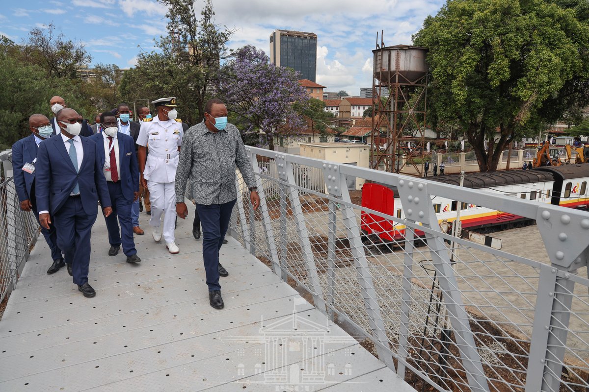 StateHouseKenya's tweet photo. President Uhuru Kenyatta views the historic Hugh F. Marriott steam engine and tours the Nairobi Central Railway Station environs during the official commissioning of the facility. | #NairobiCommuterRail https://t.co/tVFoio9hoR