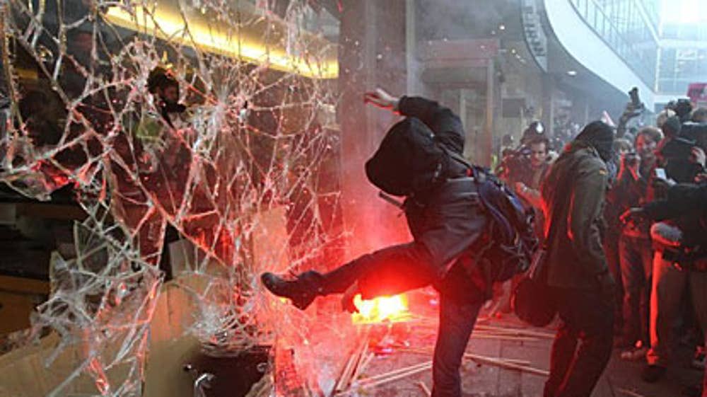 On the 10 November 2010 I was with the NCAFC bloc but loosely travelling up/down the march because as press Officer for the campaign I had to take stock of the size of things etc. I was by Millbank Tower when a group started kicking in windows as NUS stewards freaked out 