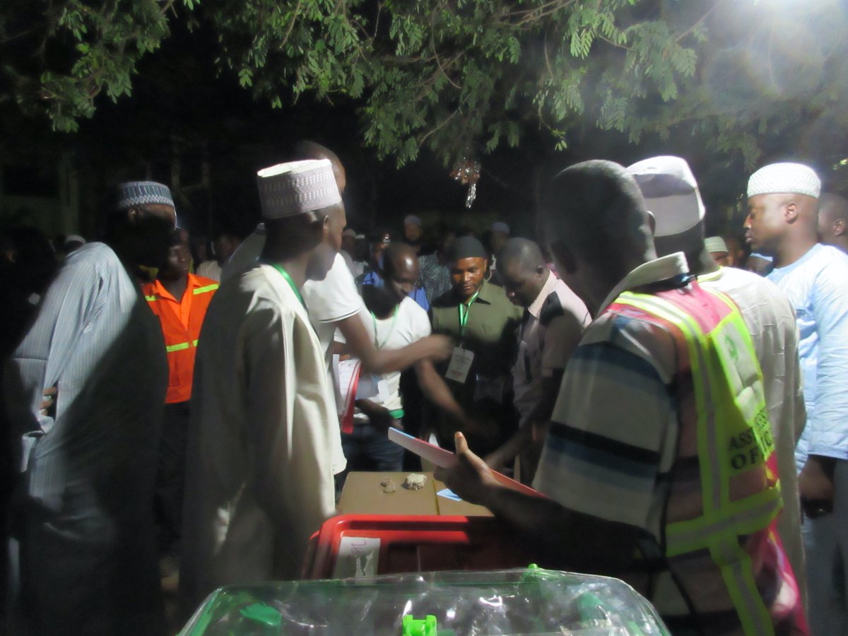 Counting of ballots began, outdoors, at night. But the precess worked. Fraud that would overturn the results did not happen.