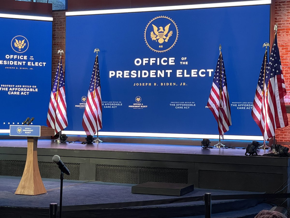Michael D Shear We Are Waiting Here In Wilmington For President Elect Joebiden To Deliver Health Care Remarks Reporters In Their Circles And The New Background Unveiled Yesterday Announcing The Office
