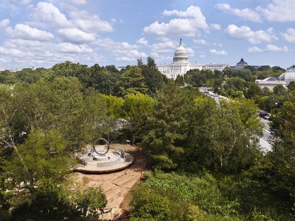 DCist's tweet photo. Today, on Veterans Day, a new memorial is being unveiled steps from the National Mall to honor the military service of Native Americans. https://t.co/Pa5wTCeEgL https://t.co/QiUngj6v1t