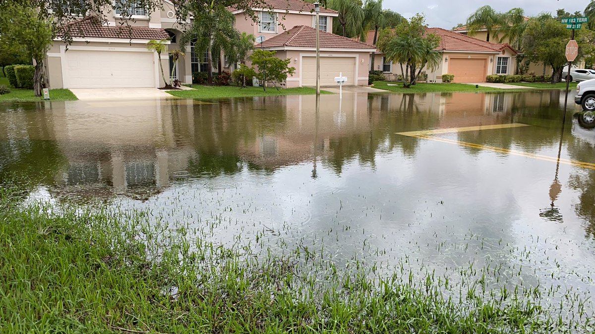 RoofingCrown's tweet photo. Heading to a new customer and this is what awaits in the streets... a lake!! No stopping A Crown Roofing! https://t.co/q1Fj7270az
