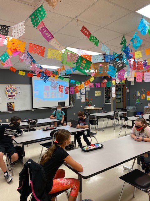 RepMoMiddle's tweet photo. As a part of the study of art from other cultures, Mrs. Zinecker’s 6th grade art classes celebrated Dia de los Muertos by creating Papel Picado (paper punching) streamers for the art room! https://t.co/sKZEeORlNL