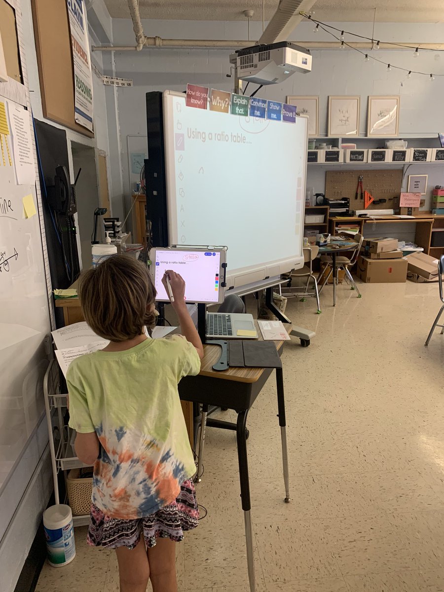 kngodbout's tweet photo. When half of the class is on zoom and the other half is sitting in the classroom. Using a math forum, Ss teaching their math models &amp; strategies #synchronousteaching #cslaSTEM https://t.co/e6OiZnOX1j
