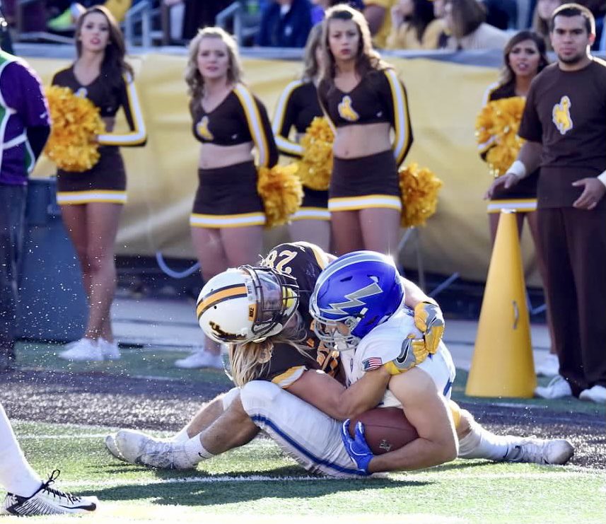 DeeJaizPhotos's tweet image. Since we’re not playing Air Force this weekend, I decided to throw up some Air Force memories that I’ve captured from past years.
TUESDAY: Wyoming safety, Dewey Wingard, wrangles down an Air Force player, preventing points on the board for the Falcons! #gopokes #kfbc #7220sports