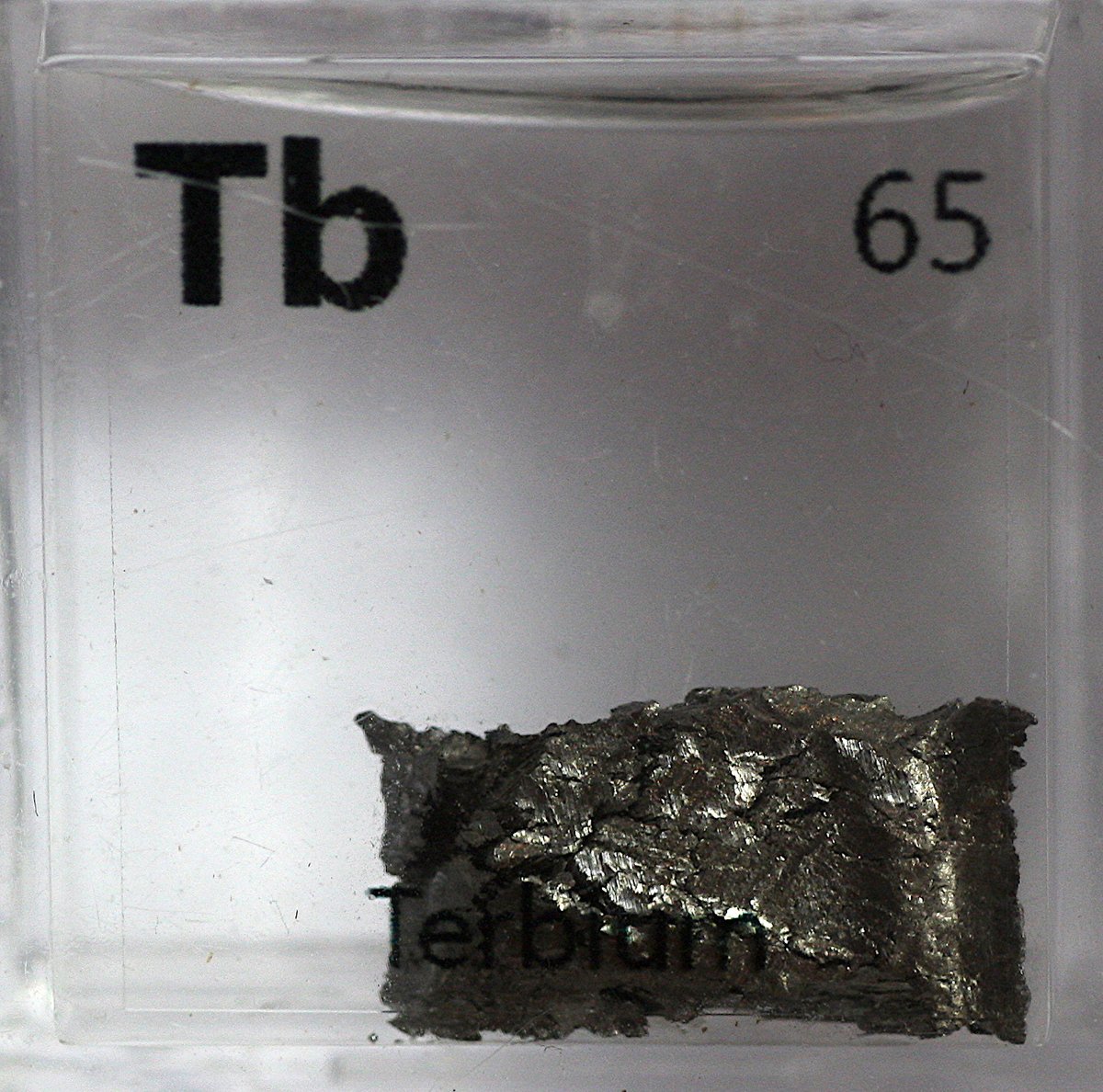 Terbium  #elementphotos. Black compound is terbium oxide (Tb4O7).