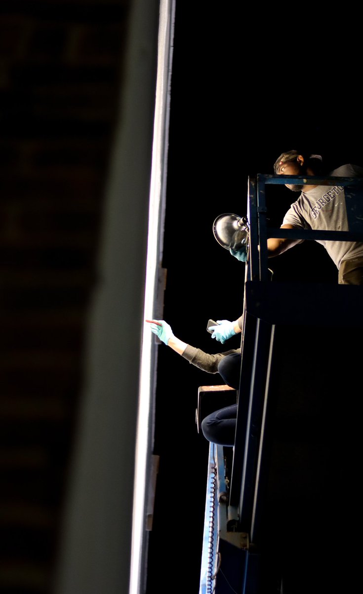 That’s Sarah Rutherford up there with Rochester native Ephraim Gebre. This isn’t her project, she’s just assisting the team with the prep work and mural.