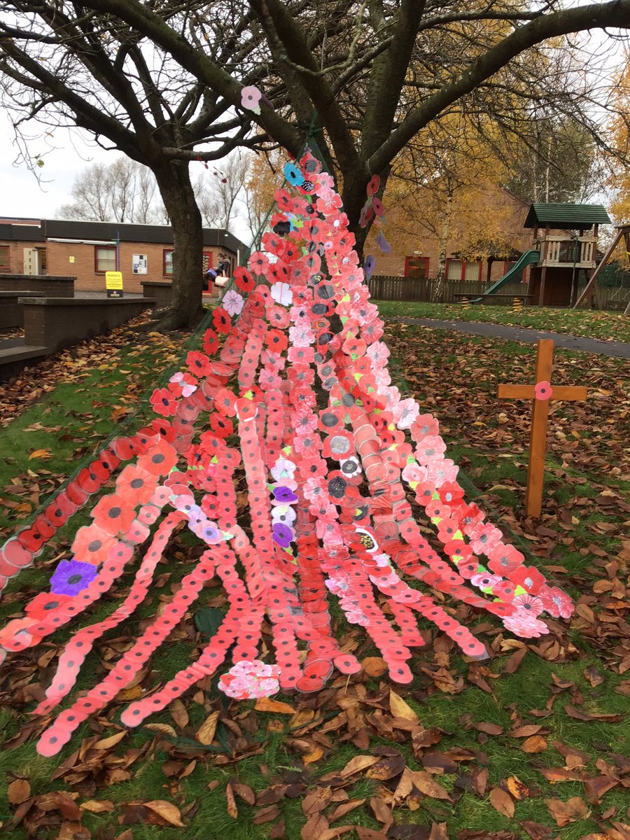 Our beautiful poppy display to remember all those who lost their lives in war .