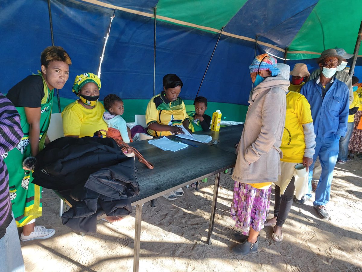 AncNcape's tweet photo. In Ward 1, Phillipstown, voters are checking their names in the voters roll before they could cast the ballot. The Pixley ka Seme Regional Chairperson, Cde Zolile Monakali, is assessing the assessing our state of readiness.
#VoteANC
#DoNotForgetYourMask https://t.co/JdstcuJFas
