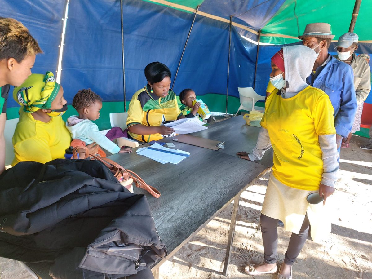 AncNcape's tweet photo. In Ward 1, Phillipstown, voters are checking their names in the voters roll before they could cast the ballot. The Pixley ka Seme Regional Chairperson, Cde Zolile Monakali, is assessing the assessing our state of readiness.
#VoteANC
#DoNotForgetYourMask https://t.co/JdstcuJFas