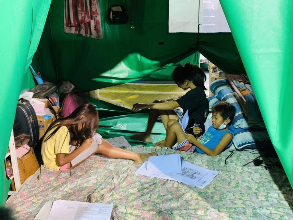 LOOK: Children continue their learning even as they have evacuated to temporary shelters in their barangay. @ABSCBNNews