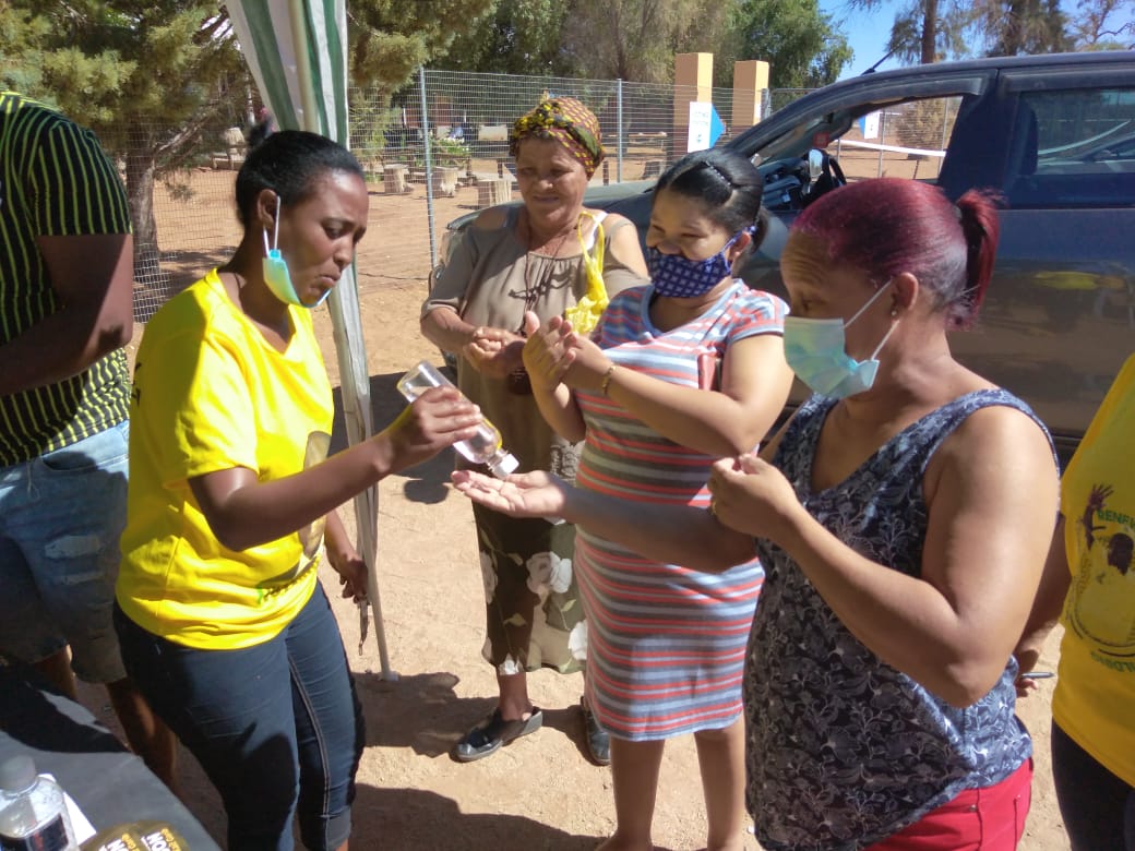 AncNcape's tweet photo. Members of the community in Currieskamp, Ward 8 Kai! Garib Sub-region sanitizing hands as they get ready to cast there vote for the ANC.
#VoteANC
#DoNotForgetYourMask https://t.co/kbLN5Rj29u