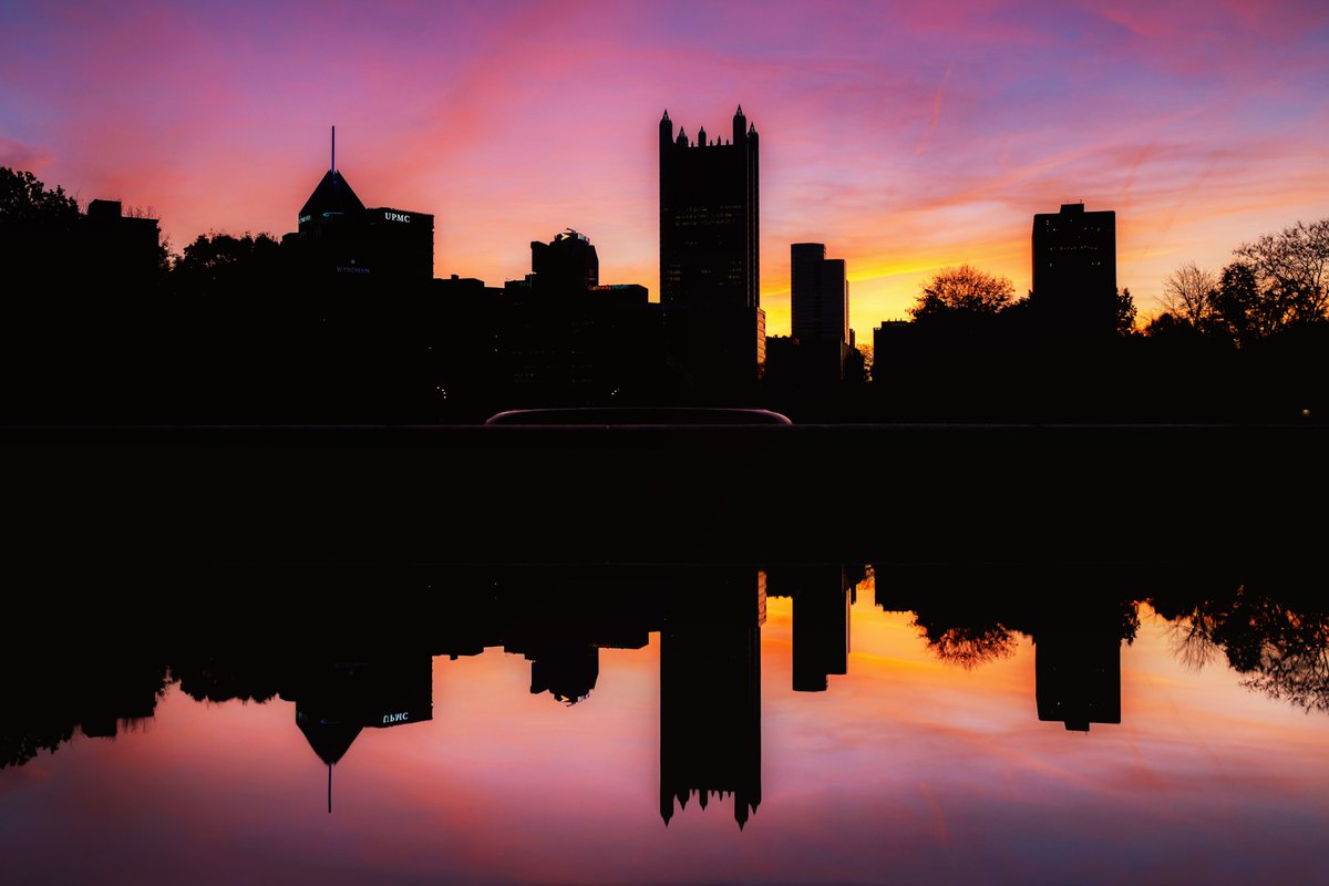 DaveDiCello's tweet image. A little color for ya on this dreary morning. While I had one camera set up to capture wide angle views of #Pittsburgh during this crazy sunrise last week, I had another one focused on tighter crops of downtown. The silhouette of the city never disappoints against a colorful sky.