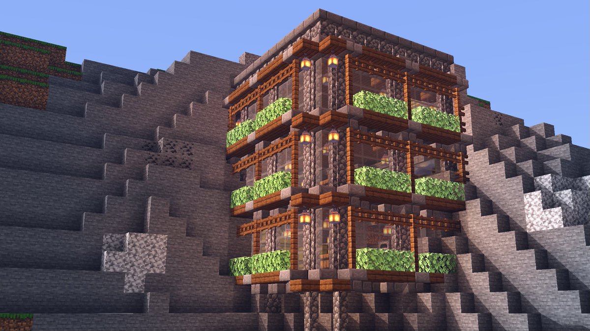 Kogumapro こぐまぷろ 崖に沿って作る拠点を作ってみました 壁は丸石の壁と板ガラスで作ってます やっぱり壁と板ガラスがぴったりくっつくのはいいですね 横にも上にも延長出来そうです マイクラ Minecraft建築コミュ マインクラフト Minecraft