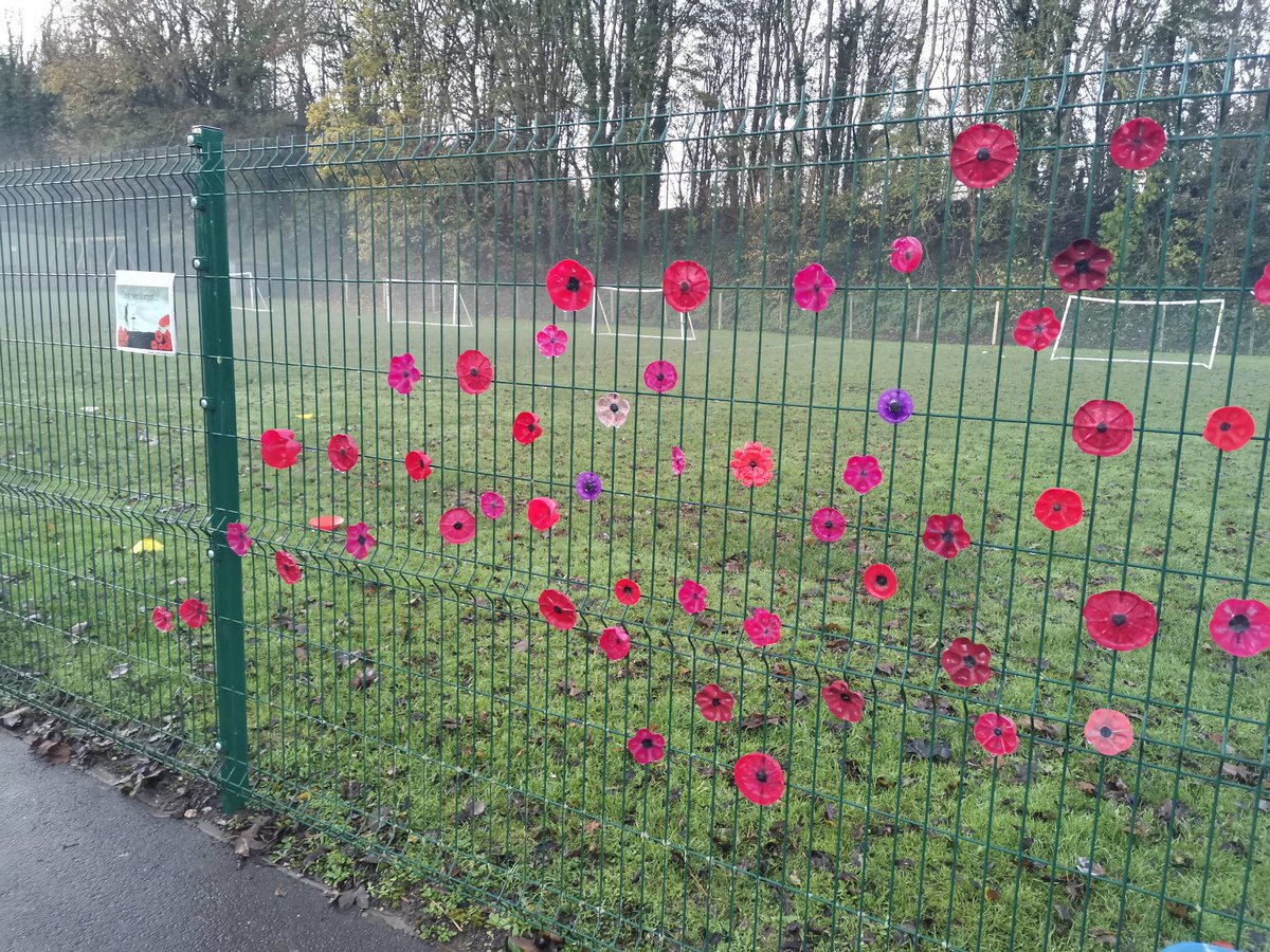 Spetisburyprim1's tweet photo. The school fell silent at 11 o'clock at the end of our Remembrance assembly. At the going down of the sun and in the morning we will remember them. Thank you all for your poppies along our fence that have helped us remember #lessweforget #remembrance https://t.co/bJORwi2lMs