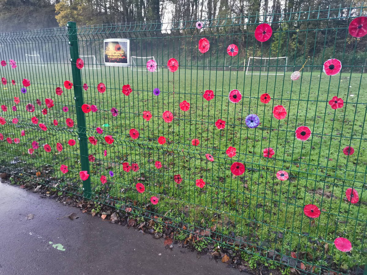 Spetisburyprim1's tweet photo. The school fell silent at 11 o'clock at the end of our Remembrance assembly. At the going down of the sun and in the morning we will remember them. Thank you all for your poppies along our fence that have helped us remember #lessweforget #remembrance https://t.co/bJORwi2lMs