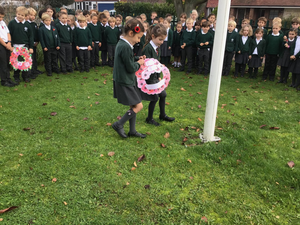 TheydonP's tweet photo. Laying wreaths by the flag pole in front of the school. https://t.co/uYM0oRkV3t