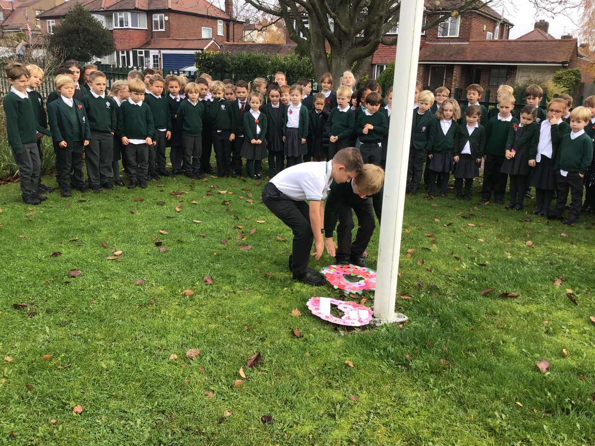 TheydonP's tweet photo. Laying wreaths by the flag pole in front of the school. https://t.co/uYM0oRkV3t