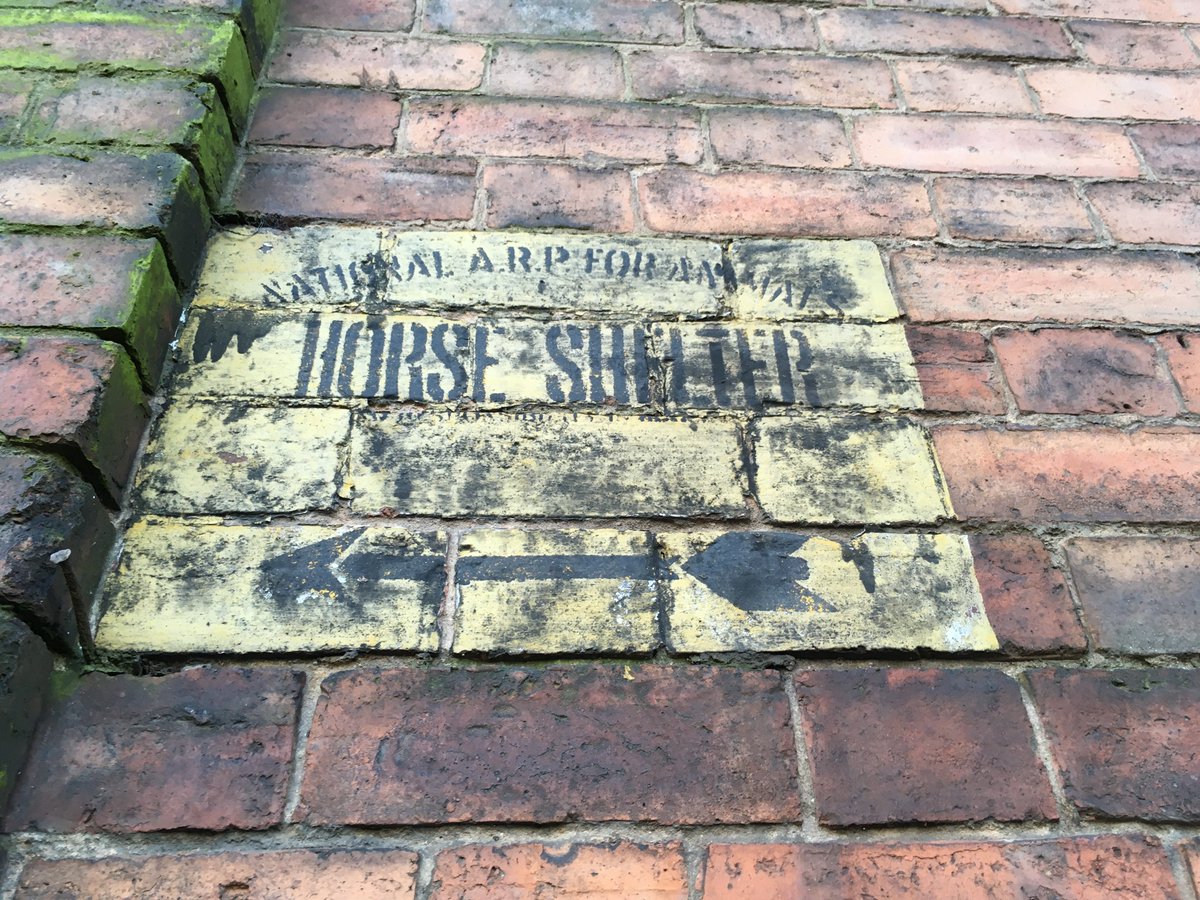CRTWestMidlands's tweet photo. The memories from War are still very much part of our canals. At Broad Street Yard in #Wolverhampton there is a very rare faded yellow sign with black lettering, painted on the brickwork. It reads: ‘NATIONAL A.R.P (Air raid precautions). FOR ANIMALS HORSE SHELTER’. https://t.co/fOXVwfhDX8