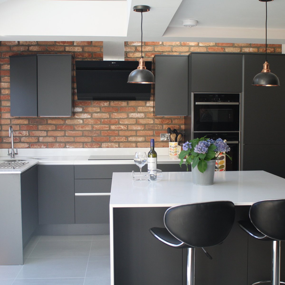 For a modern rustic style the exposed brick has an industrial feel, yet adds warmth as well as rawness.

Client project photo. 

#Kitchendesign #IndustrialKitchen #York #CliftonMoor #KitchenShowroom #Brick #GreyKitchen #IndustrialHome #RealHome