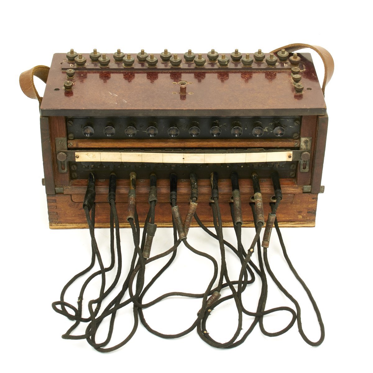 This Tiger commander uses his sleep pit/shelter to speak to another unit or units via a standard feldfernsprecher 33 (telephone). Connected to another phone or 10 line exchange, he’s clearly in a semi-permanent position to have such communication in place. Who to though?46)