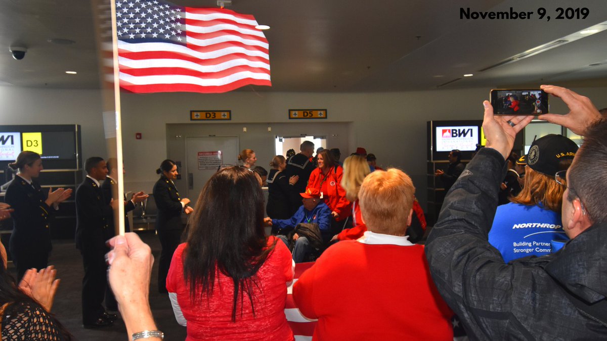 Archive photograph of an Honor Flight arrival celebration at BWI Marshall Airport.