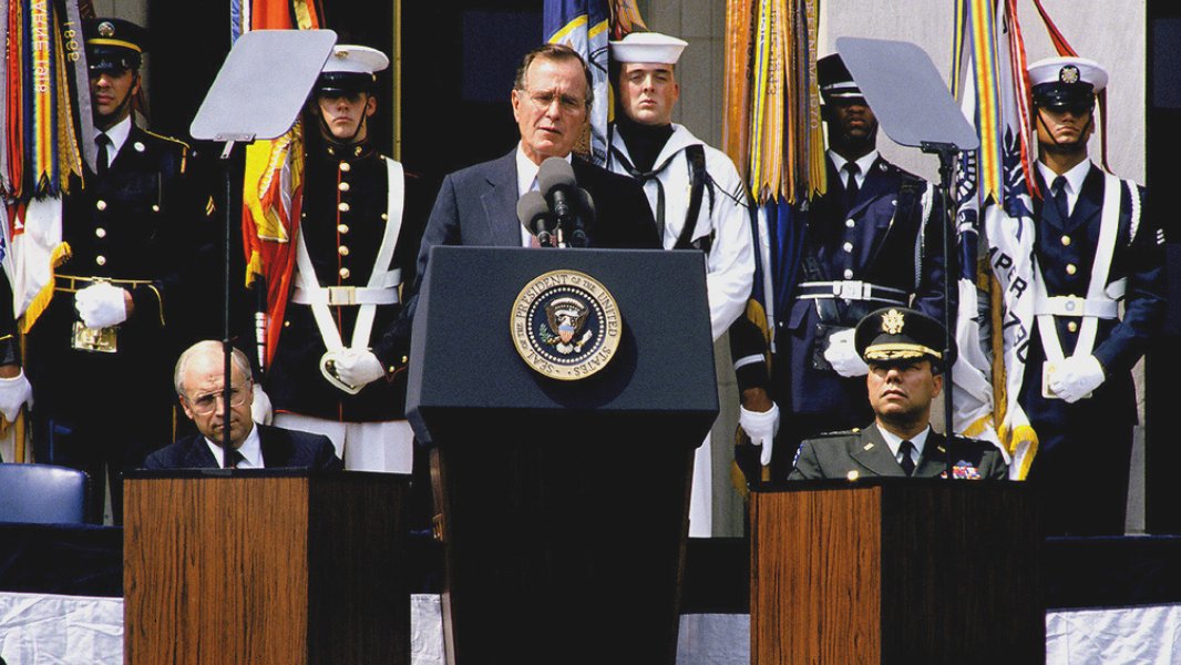 8/ #VeteransDay, 1990: President Bush (H.W.), who flew 58 combat missions in the Pacific during World War II, speaks at Arlington