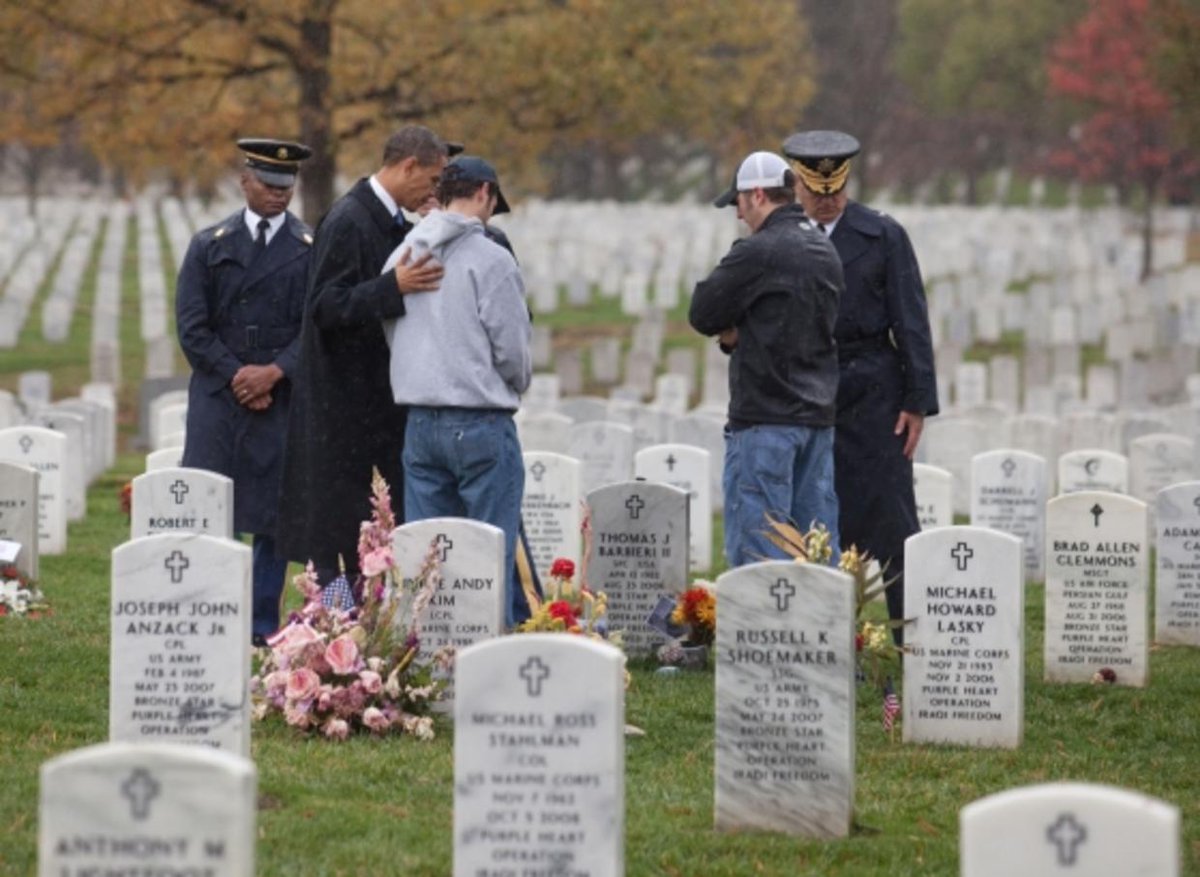 11/ #VeteransDay, 2009: At the conclusion of traditional Veterans Day ceremonies, President Obama stopped at Section 60 to visit with Stephen and Matthew Barbieri at the grave of their brother - Army Spec. Thomas ("T.J.") - who was killed in Iraq