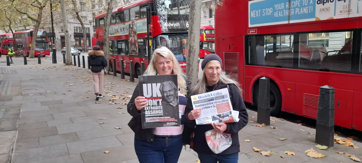 JA_Defence's tweet photo. Two by two Australia House witness to Julian #Assange suffering. More supporters show up for pamphlet parade. Thank you #WLsup!! https://t.co/4TiM7QGhAy