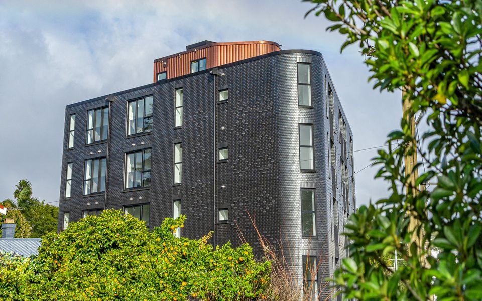 The majestic 6 storey apartment block. This beast is slapping 32 apartments in the space of a single house. You'd only need one of these on every third street like ours'.