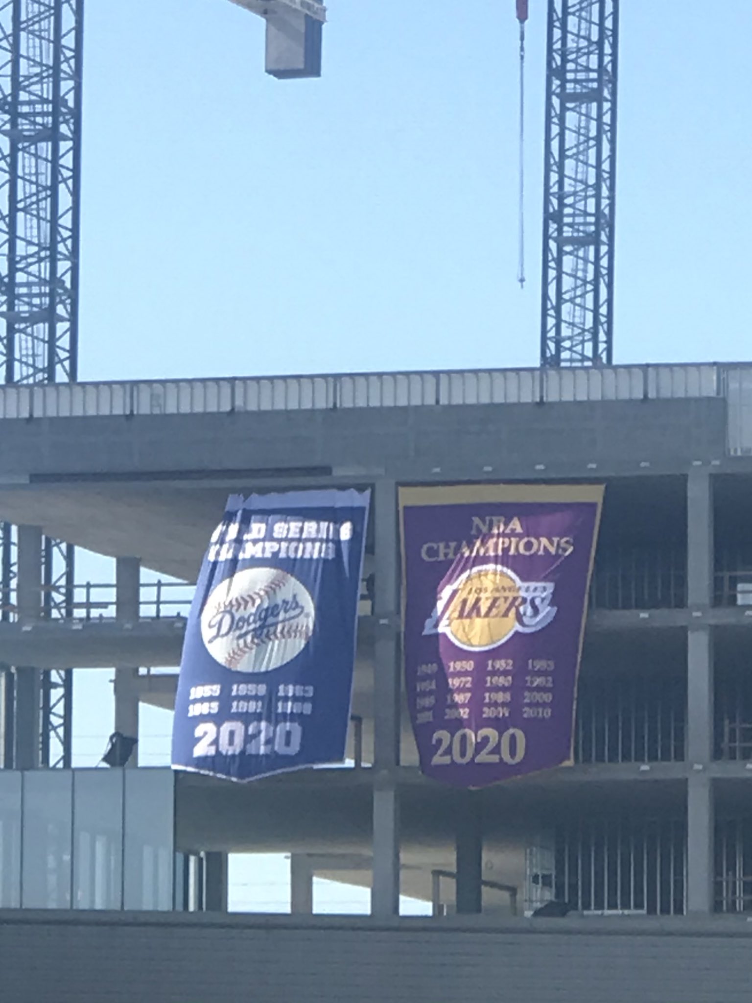 Arash Markazi on X: Championship banners for the Lakers and Dodgers at a  construction site off the 405 freeway near Culver City.   / X