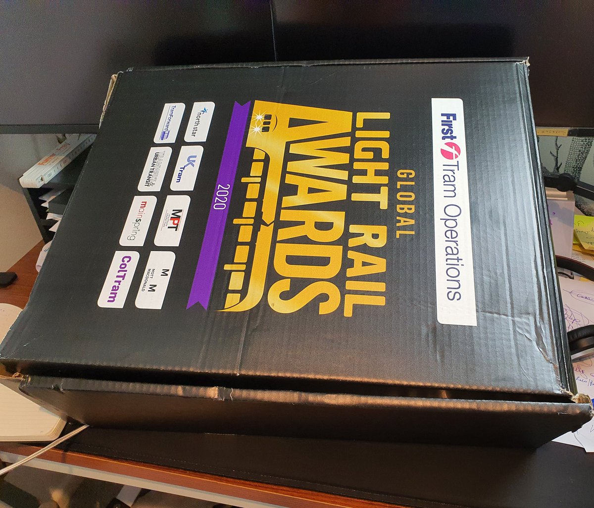 NoelDolphin's tweet photo. The @MainspringUK Gobal Light Rail Award starting in under an hour. I have the picnic dinner - one problem, it does not fit on my desk #glra20 https://t.co/cXkzfK5jdw