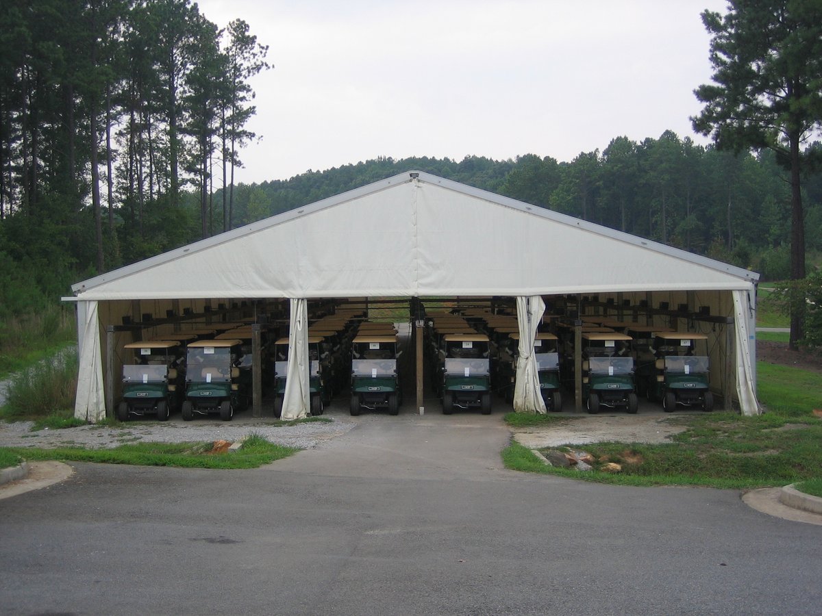 FLEXTConstruct's tweet photo. CART BARNS!  Yes, FLEXTC has cart barns!  When sheltered space is needed for storing, cleaning, fueling, maintaining, or repairing golf carts, FLEXTC has the perfect solutions. https://t.co/suaqzJ28ZC