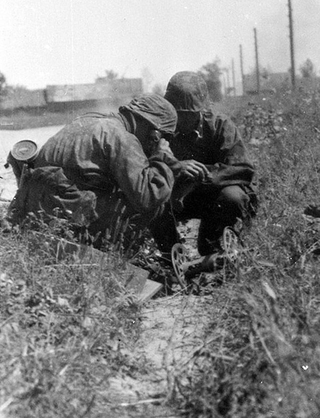 Communication established, the team start to repack their vehicle to move on, as smoke trails to their right. 47c)
