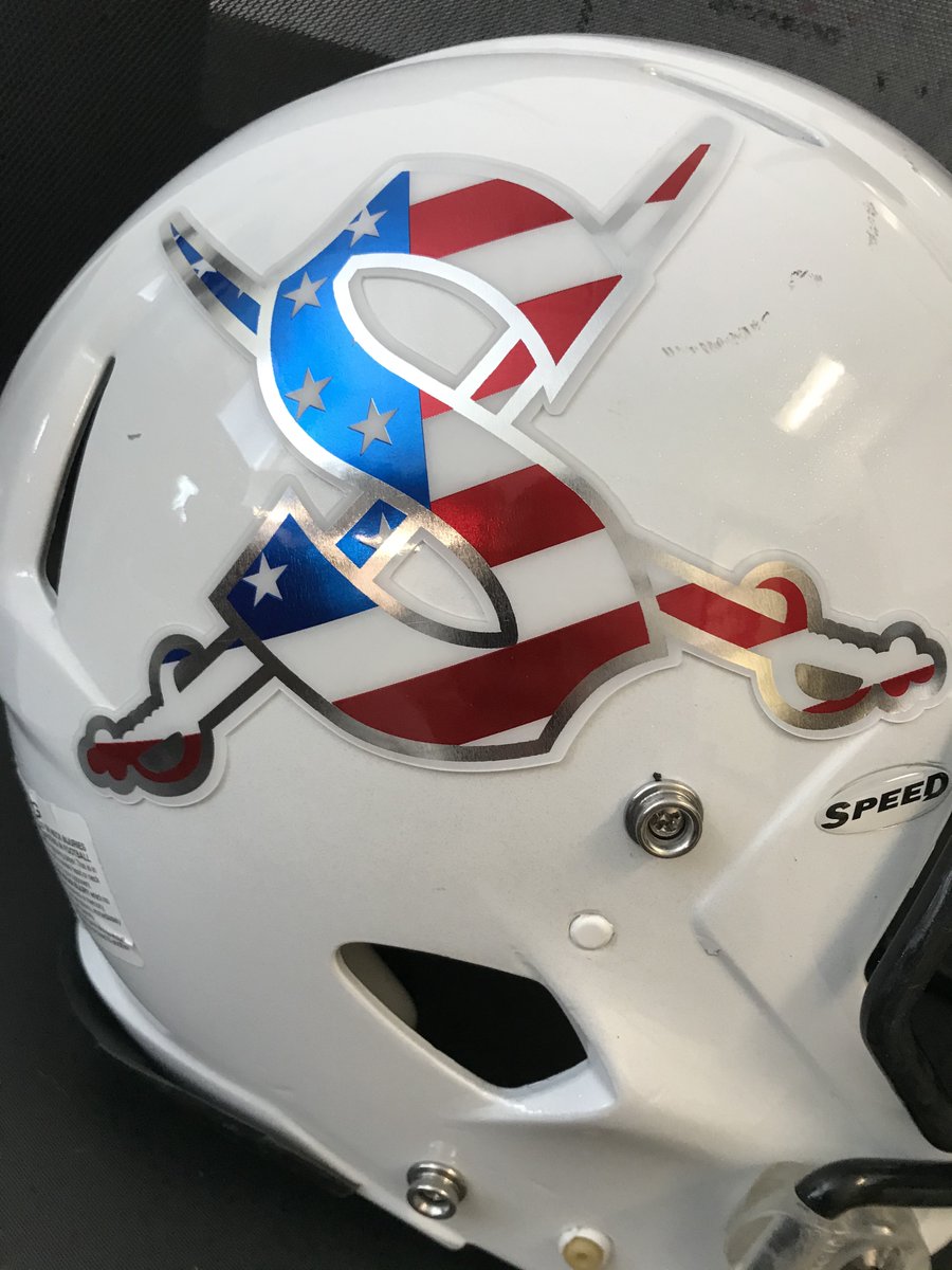 SeguinISD's tweet photo. This week, Matador Football is proud to salute those who served. Head Coach Travis Bush arranged for red, white and blue decals to be placed on each helmet. Additionally, each branch of the United States military is represented on the helmet stripes. #SeguinStrong https://t.co/xA5qruvbM0
