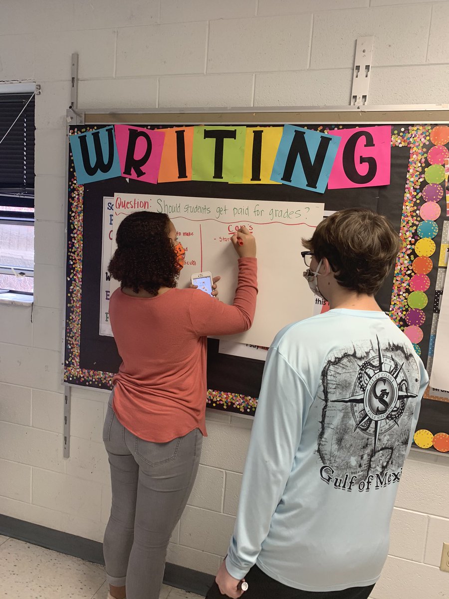 RDavisGMS's tweet photo. Today in small groups, we wrote argument thesis statements and then transported them into strong introductions. Gosh it feels so good to have kids in my classrooms!๐๐พ #GMS #shapingscotties #makingthemiddlematter #thankfulforsmallgroups @GMSRMurphy https://t.co/lurgi1bZ5A