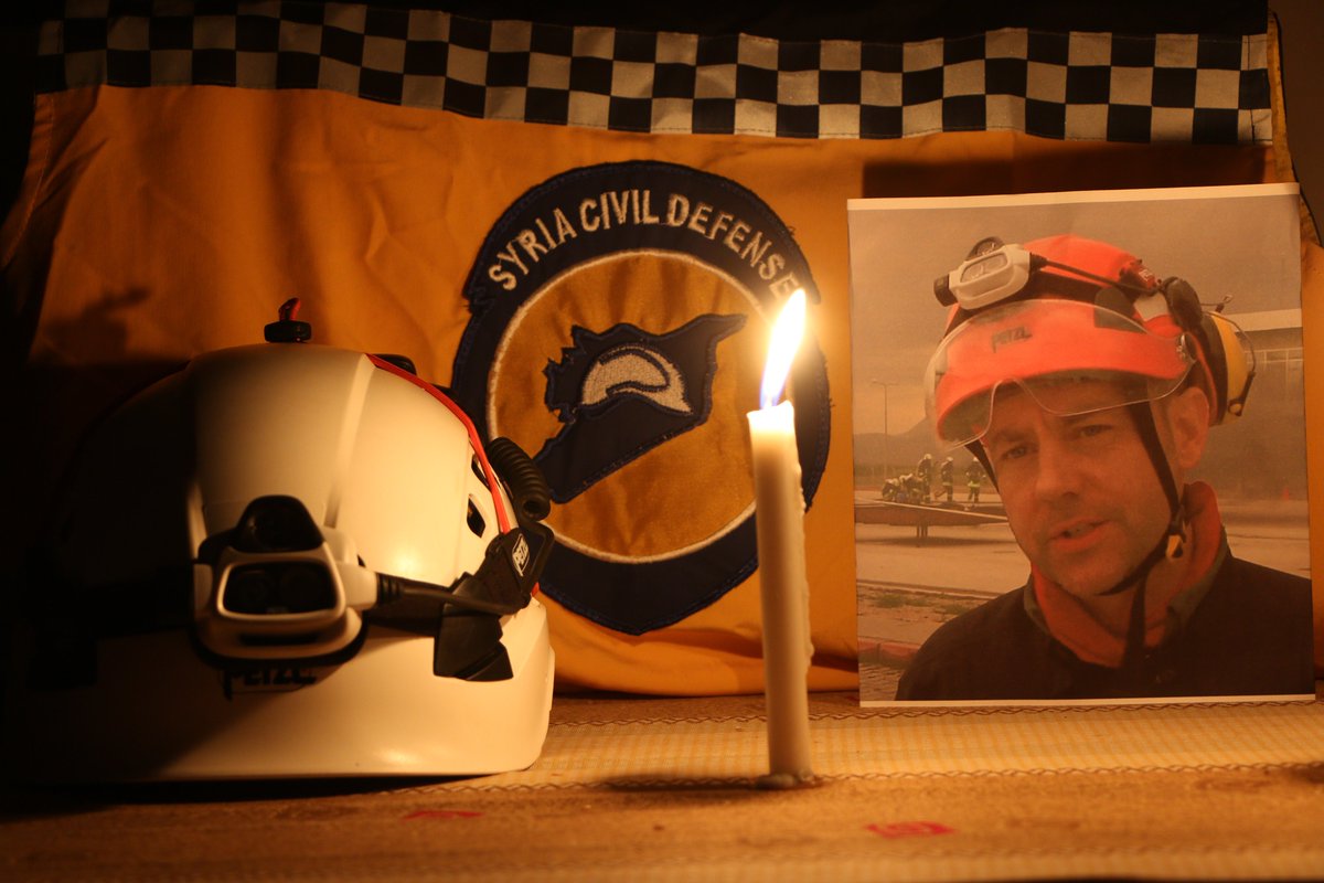 SyriaCivilDef's tweet photo. Not all heroes wear capes: Our friend @lemesurierjames wore a helmet. The difference we can make today is a tribute to James's relentless belief in us. The #WhiteHelmets stand in respect, with our helmets off to a man who will always be by our side. https://t.co/0gA42GGdn8