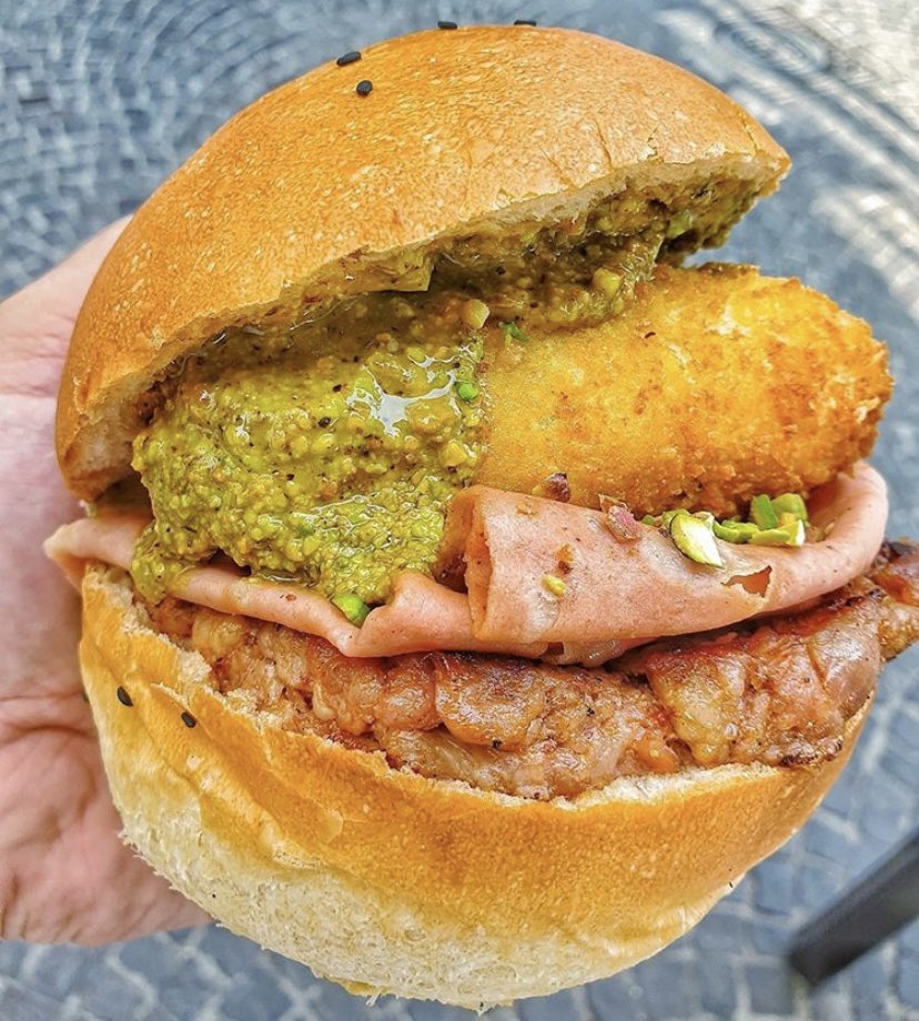 PiggyTravelling's tweet photo. Do you want to #eat an #Unforgettable #burger 🍔? I suggest you this #burger below with #bacon #mortadella #crocche and pistachio grain!! You can find it in #Italy but let's not forget that its origin come from #America. 🐷❤️ https://t.co/jOfFpNTHEz