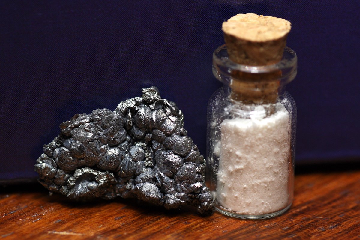 Dysprosium  #elementphotos. White compound is dysprosium triflate (Dy(O3SCF3)3). Love the texture on some of these samples.